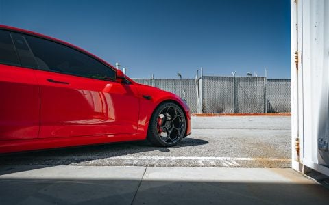 Bright Red 2024 Tesla Model 3 Performance 20 inch UP-05 Wheels in Gloss Black