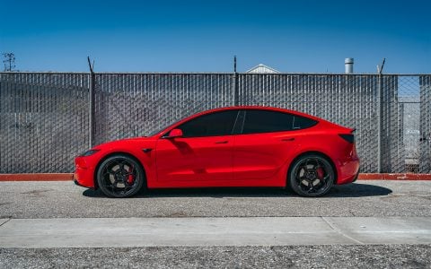 Bright Red 2024 Tesla Model 3 Performance 20 inch UP-05 Wheels in Gloss Black
