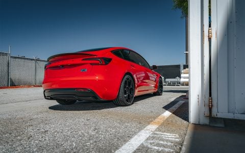 Bright Red 2024 Tesla Model 3 Performance 20 inch UP-05 Wheels in Gloss Black