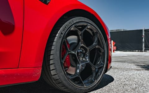 Bright Red 2024 Tesla Model 3 Performance 20 inch UP-05 Wheels in Gloss Black