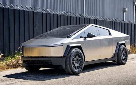 Side profile of Tesla Cybertruck equipped with 50mm wheel spacers from Unplugged Performance. The spacers push the wheels outward, delivering an assertive stance and enhanced road grip, ideal for off-road adventures.