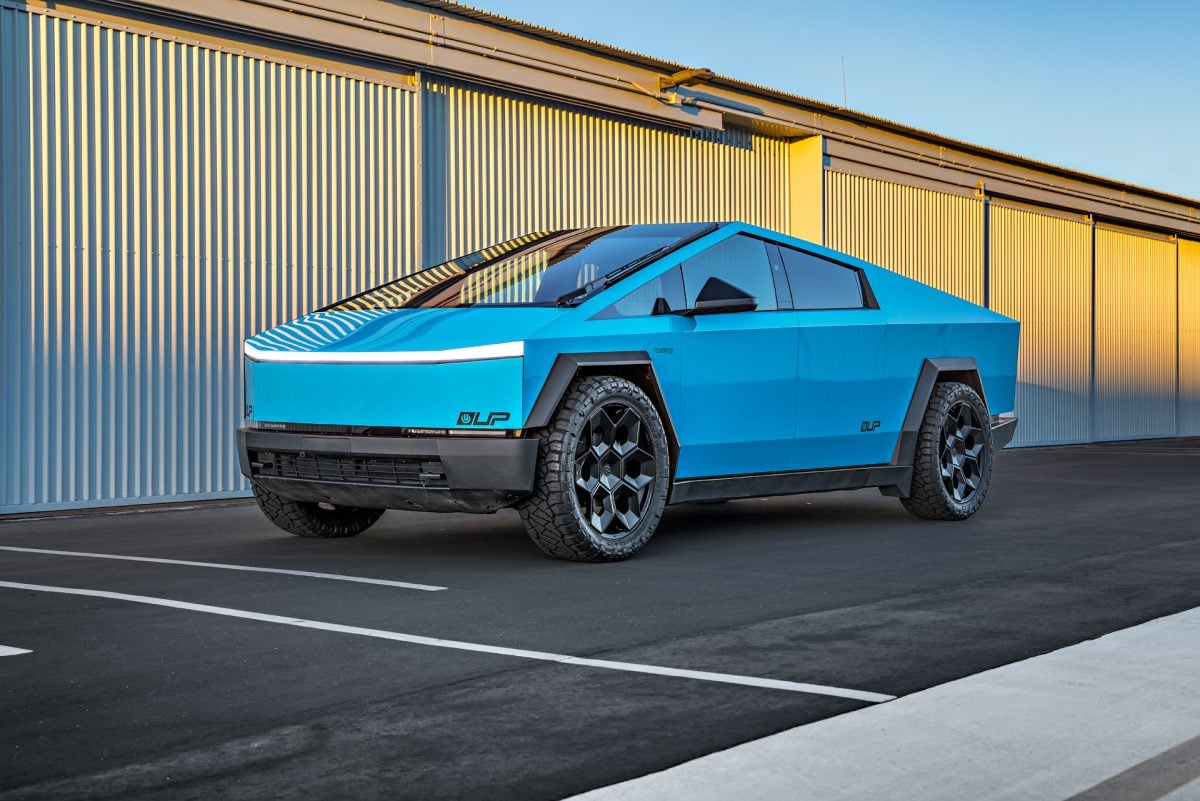 Gloss Sky Blue Wrapped Tesla Cybertruck on 24 inch CYBRHEX wheels in Satin Black