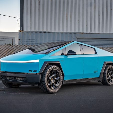 Gloss Sky Blue Wrapped Tesla Cybertruck on 24 inch CYBRHEX wheels in Satin Black