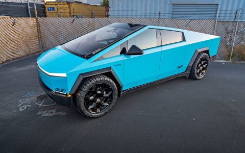 Gloss Sky Blue Wrapped Tesla Cybertruck on 24 inch CYBRHEX wheels in Satin Black