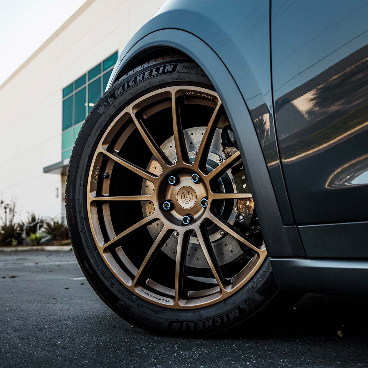 Stealth Grey Model X Long Range: Subtle Upgrades, Big Everyday Impact 4 Tesla-Model-X-Stealth-Grey-UP-Forged-UP-03-Satin-Bronze-Wheels-UP-Lowering-Brackets-Big-Brake-Kit-Unplugged-Performance-2