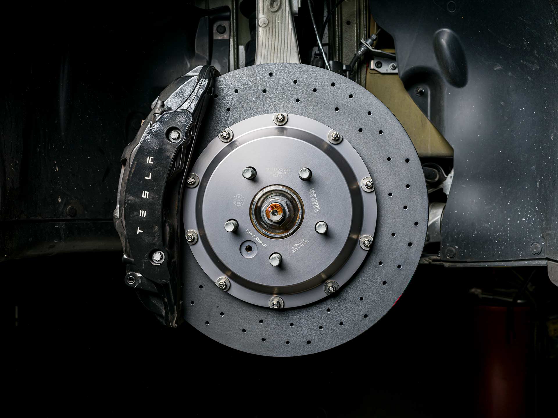 Stealth Grey Model X Long Range: Subtle Upgrades, Big Everyday Impact 3 Tesla Model X Stealth Grey UP Forged UP-03 Satin Bronze Wheels UP Lowering Brackets Big Brake Kit Unplugged Performance 3