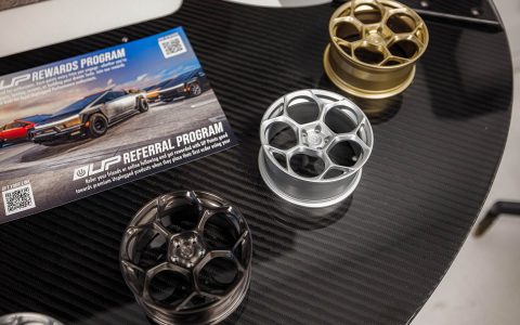 Welcoming Hundreds of Tesla Enthusiasts to Experience the Future of Tesla Customization 17 Unplugged Performance parts display showcase for guests to view and learn more about.